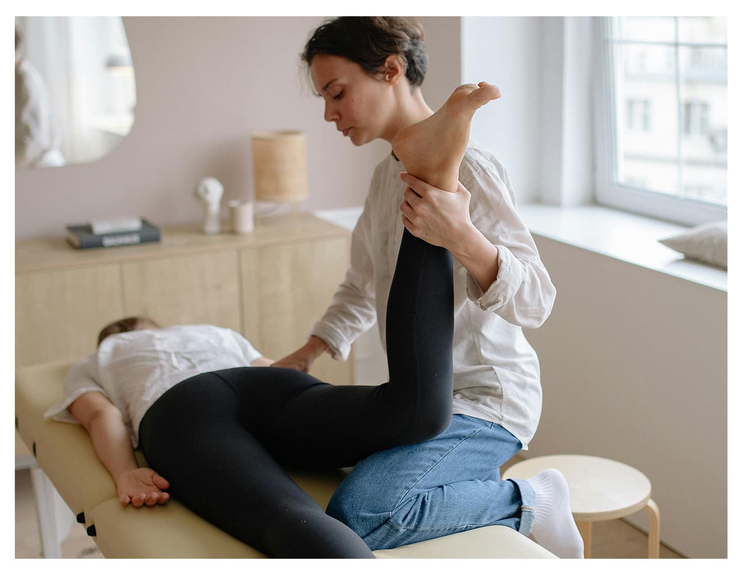 A patient undergoing a kinesiology treatment.